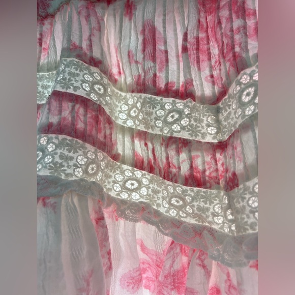 Love Shack Fancy Cove Miniskirt
White with pink floral design - Picture 9 of 9